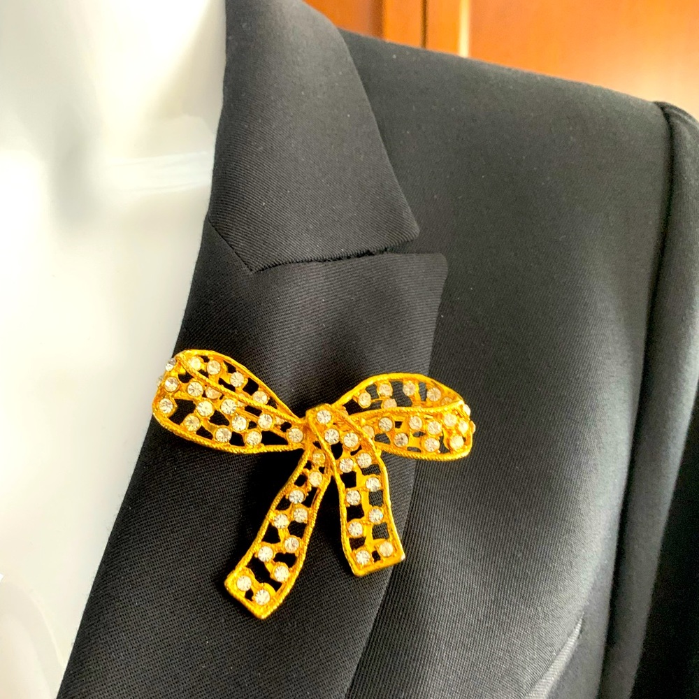 Stunning Gold Tone Metal Bow shaped Brooch Pin back with Shiny Zirconium stones